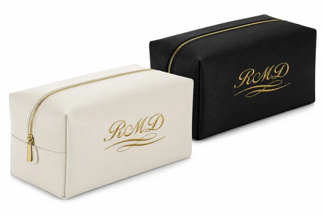 Large toiletry/accessory case with saffiano fine grain finish and gold zip closure